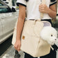 dog-securely-strapped-in-booster-seat